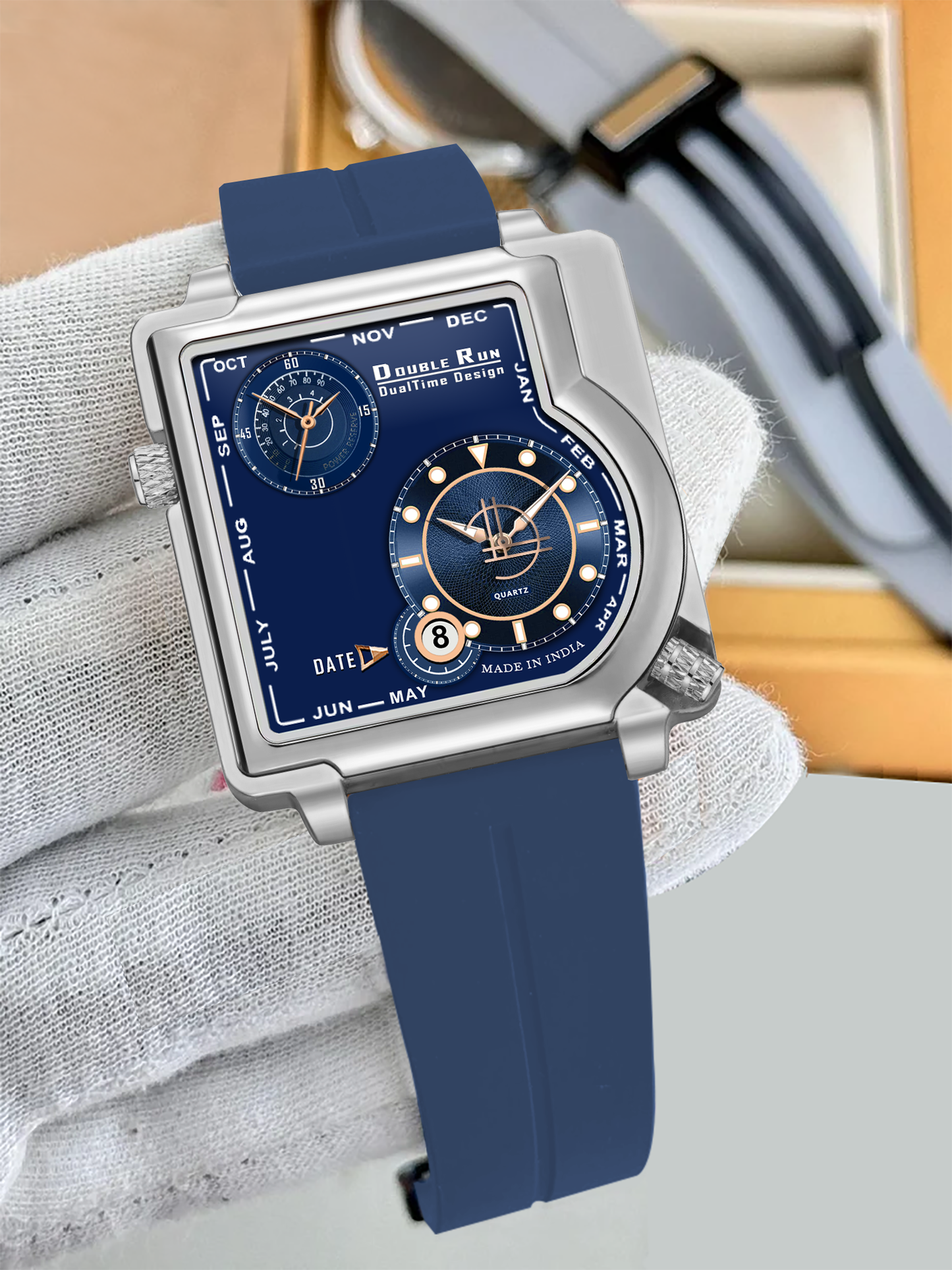 Double Run DualTime men’s square dial blue silicone strap watch with dual time and date display.